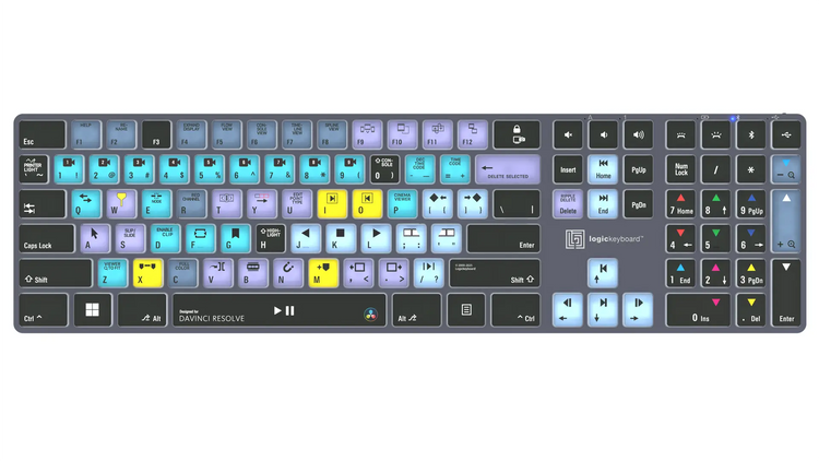 Logickeyboard TITAN DaVinci Resolve Classic Keyboard for Windows — top-down view showing full-size 108-key ANSI backlit layout with 60+ color-coded DaVinci Resolve shortcut keys illuminated — Bluetooth 5.1, USB-C, Titanium Gray, scissor-switch keys
