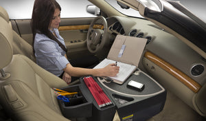 Sales rep using AutoExec Express mobile office car desk between appointments