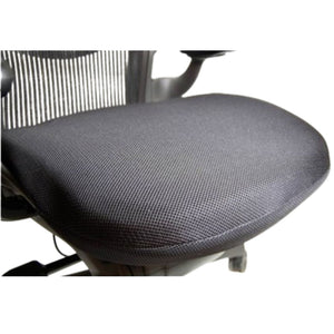 Side profile of Stratta Aeron Seat Cushion highlighting 2-inch high-density BioFlex hybrid foam thickness designed to retrofit Herman Miller Aeron mesh chairs while preserving airflow and ergonomic support.