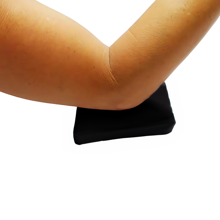 Wedge-Ease ergonomic forearm support for lab and microscope work - wrist and arm cushion in use